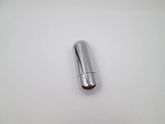 Oil Bar cylindrical petrol cigarette lighter. Silver plated & golden metal. Japan. 1980's