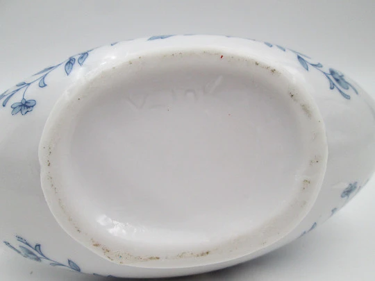 Oil lamp / hand lamp. Blue and white porcelain. Floral motifs. Boat shape. Europe. 1970's