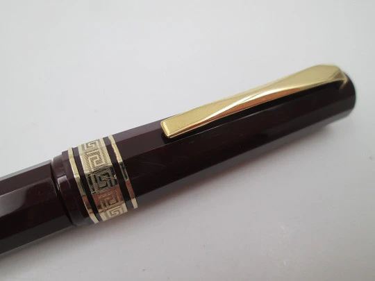 Omas 555 art deco fountain pen. Burgundy faceted resin and gold plated details. 1990's