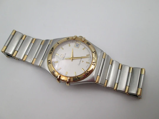 Omega Constellation. Acero y oro 18k. Cuarzo. Brazalete. Calendario. 2000