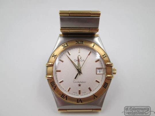 Omega Constellation. Acero y oro amarillo. Cuarzo. Unisex. 2003. Caja