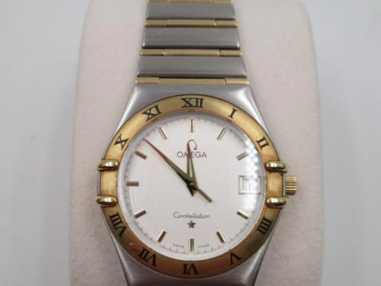 Omega Constellation. Acero y oro amarillo. Cuarzo. Unisex. 2003. Caja