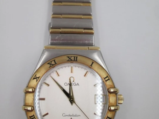 Omega Constellation. Acero y oro amarillo. Cuarzo. Unisex. 2003. Caja