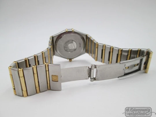 Omega Constellation. Steel & yellow gold. 2003. Quartz. Box. Unisex