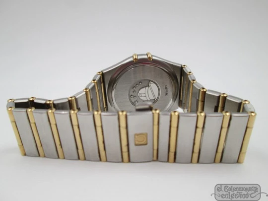 Omega Constellation. Steel & yellow gold. 2003. Quartz. Box. Unisex