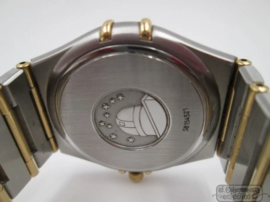 Omega Constellation. Steel & yellow gold. 2003. Quartz. Box. Unisex