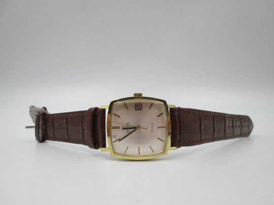 Omega De Ville. Acero y chapado oro. Caja cuadrada. Automático. Correa piel. 1960