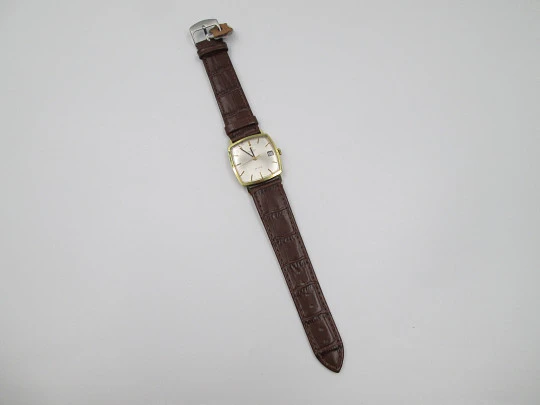 Omega De Ville. Acero y chapado oro. Caja cuadrada. Automático. Correa piel. 1960