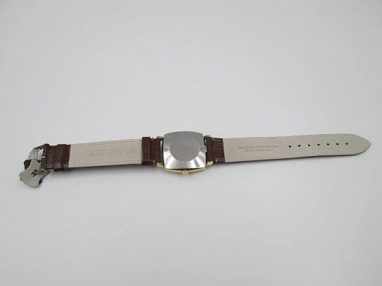 Omega De Ville. Acero y chapado oro. Caja cuadrada. Automático. Correa piel. 1960