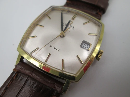 Omega De Ville. Acero y chapado oro. Caja cuadrada. Automático. Correa piel. 1960