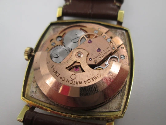 Omega De Ville. Acero y chapado oro. Caja cuadrada. Automático. Correa piel. 1960
