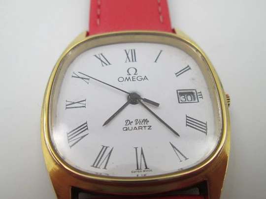 Omega De Ville. Steel and gold plated. Calendar. Quartz. Leather strap. 1980's