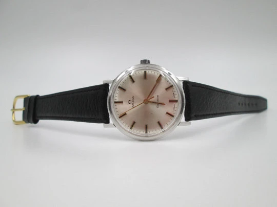 Omega Genève men's watch. Stainless steel. Manual wind. Leather strap. Swiss. 1960's