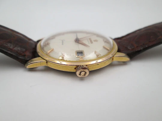Omega Genève. 20 micron gold plated and steel. Automatic. Strap. Red box. 1960's