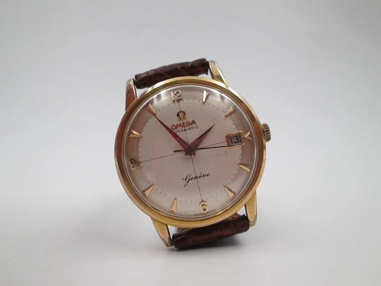 Omega Genève. 20 micron gold plated and steel. Automatic. Strap. Red box. 1960's