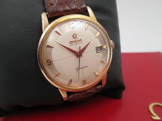 Omega Genève. 20 micron gold plated and steel. Automatic. Strap. Red box. 1960's