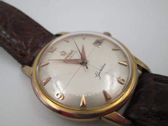 Omega Genève. 20 micron gold plated and steel. Automatic. Strap. Red box. 1960's