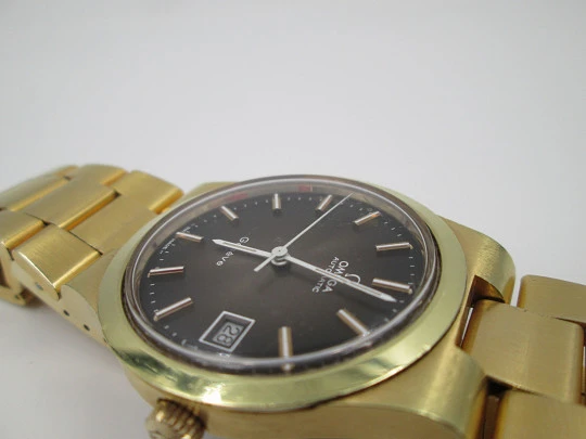Omega Genève. 20 microns gold plated. Automatic. 1970's. Iridescent dial