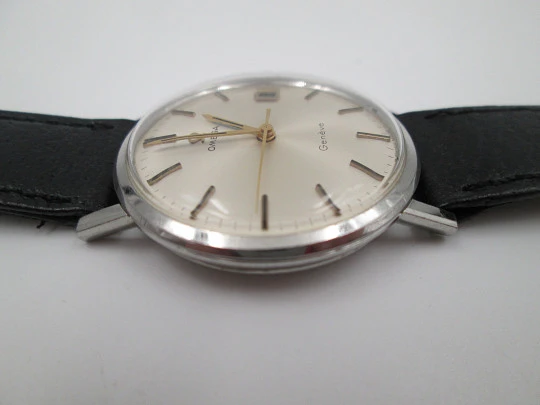 Omega Genève. Acero inoxidable. Cuerda manual. Calendario. Correa. Suiza. 1960