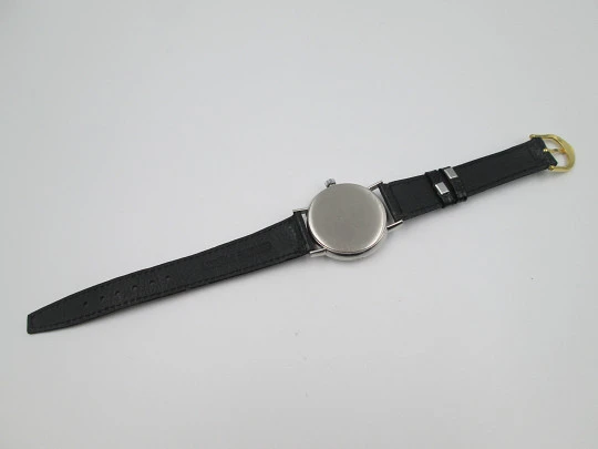 Omega Genève. Acero inoxidable. Cuerda manual. Correa piel negra. Suiza. 1960