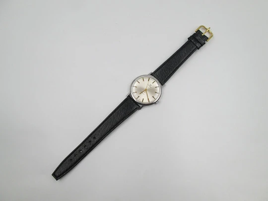 Omega Genève. Acero inoxidable. Cuerda manual. Correa piel negra. Suiza. 1960