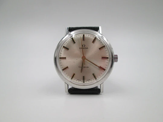 Omega Genève. Acero inoxidable. Cuerda manual. Correa piel negra. Suiza. 1960