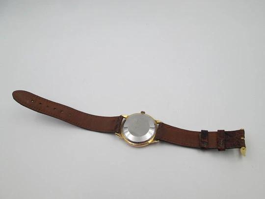 Omega Genève. Chapado oro 20 micras y acero. Automático. Correa. Estuche. 1960