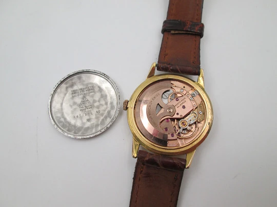 Omega Genève. Chapado oro 20 micras y acero. Automático. Correa. Estuche. 1960