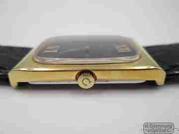 Omega Genève. Chapado oro 20 micras y acero. Cuerda. Dial Ojo Tigre