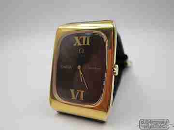 Omega Genève. Chapado oro 20 micras y acero. Cuerda. Dial Ojo Tigre