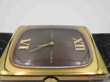 Omega Genève. Chapado oro 20 micras y acero. Cuerda. Dial Ojo Tigre