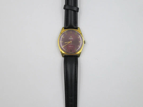 Omega Genève. Chapado oro / acero. Automático. Años 70. Dial morado