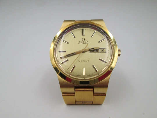 Omega Genève. Chapado oro y acero. Automático. Calendario. Brazalete. 1970