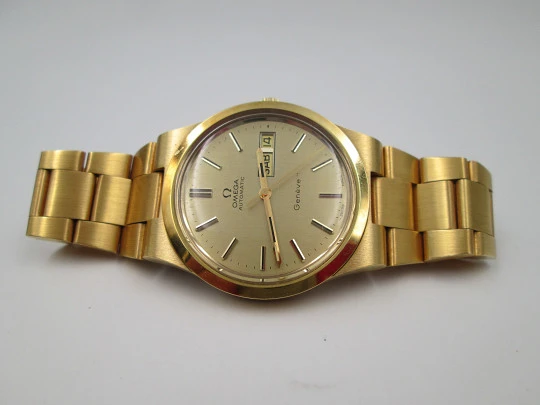 Omega Genève. Chapado oro y acero. Automático. Calendario. Brazalete. 1970