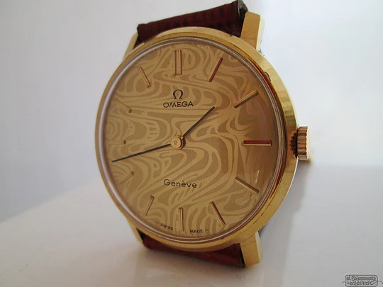 Omega Genève. Cuerda. Baño oro 20 micras / acero. Dial decorado