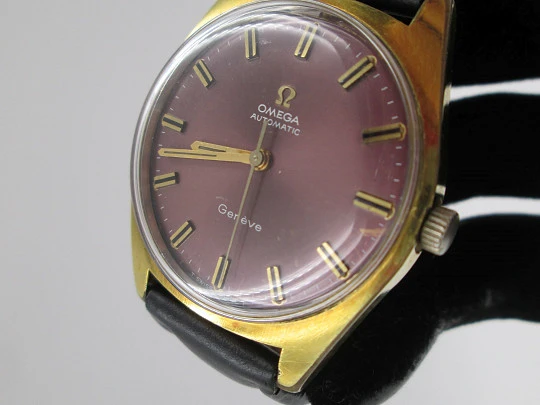 Omega Genève. Stainless steel & gold plated. Automatic. 1970's. Purple dial