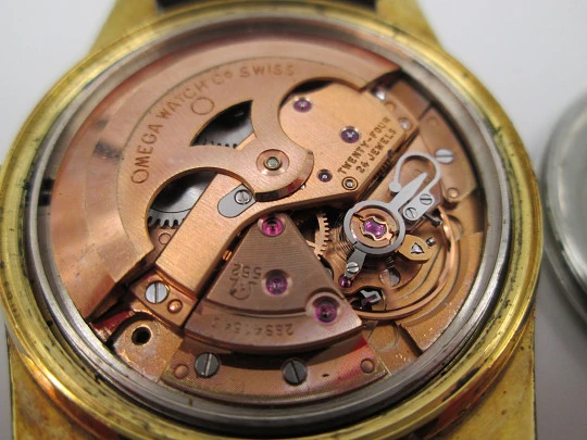 Omega Genève. Stainless steel & gold plated. Automatic. 1970's. Purple dial