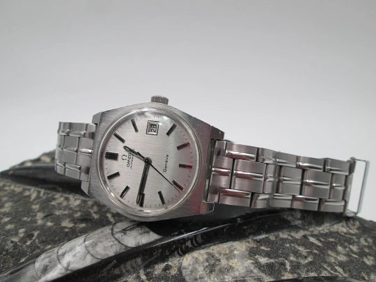 Omega Genève. Stainless steel. 1970's. Date. Automatic. Bracelet. Swiss