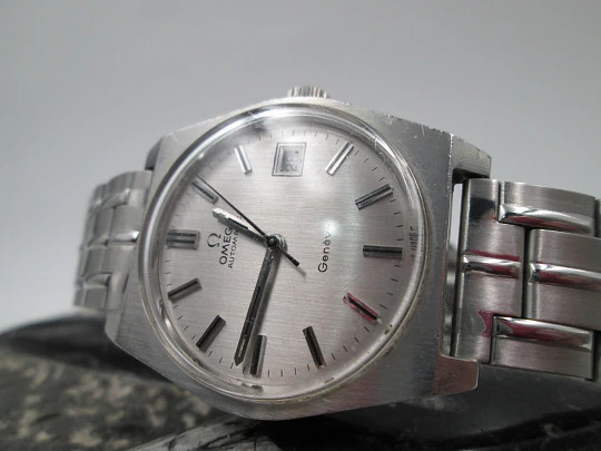 Omega Genève. Stainless steel. 1970's. Date. Automatic. Bracelet. Swiss