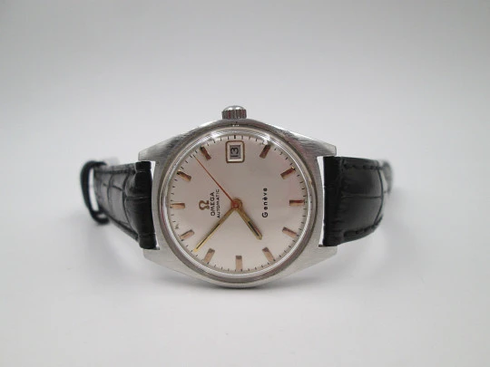 Omega Genève. Stainless steel. Automatic. Date. Strap. 1960's