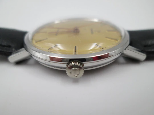Omega Genève. Stainless steel. Circa 1960's. Manual wind. Black strap