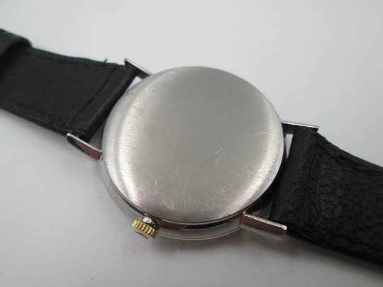 Omega Genève. Stainless steel. Manual wind. Calendar. Leather strap. Swiss. 1960's