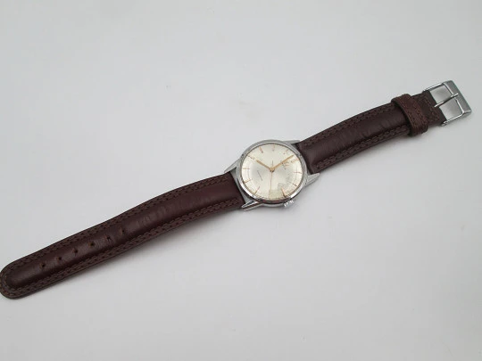 Omega Genève. Stainless steel. Manual wind. Leather strap. 1970's. Swiss