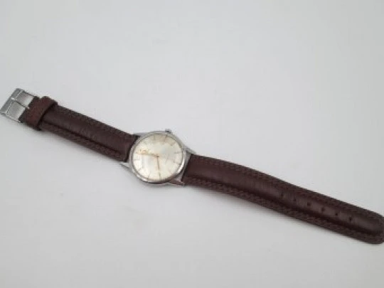 Omega Genève. Stainless steel. Manual wind. Leather strap. 1970's. Swiss