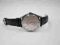 Omega Jumbo. Cuerda manual. Acero inoxidable. Correa. Años 50. Suiza