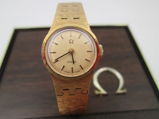 Omega ladie's watch. 20 micron gold plated & steel. Manual wind. Box. 1970's