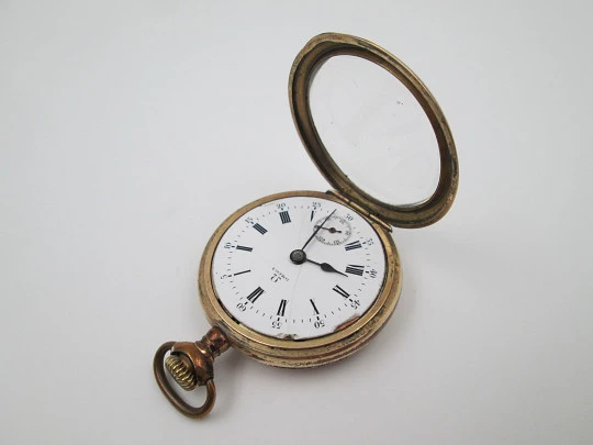 Omega lepine. Metal chapado oro. Cuerda remontoir. Esfera porcelana. Suiza. 1900
