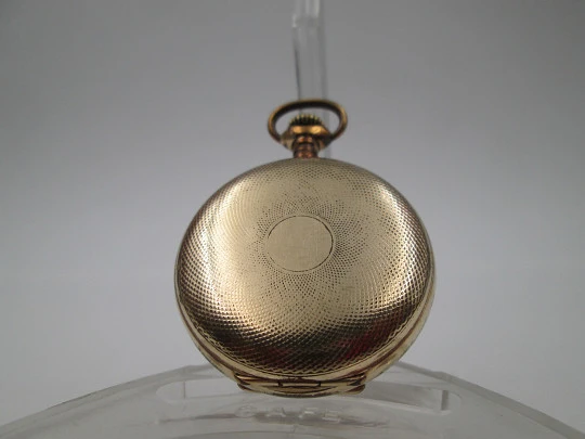 Omega lepine. Metal chapado oro. Cuerda remontoir. Esfera porcelana. Suiza. 1900