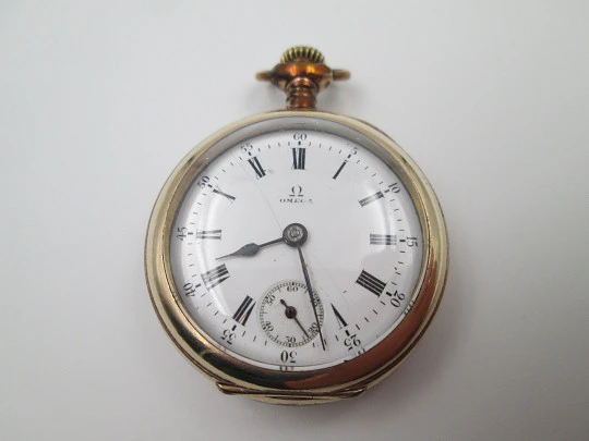 Omega lepine. Metal chapado oro. Cuerda remontoir. Esfera porcelana. Suiza. 1900