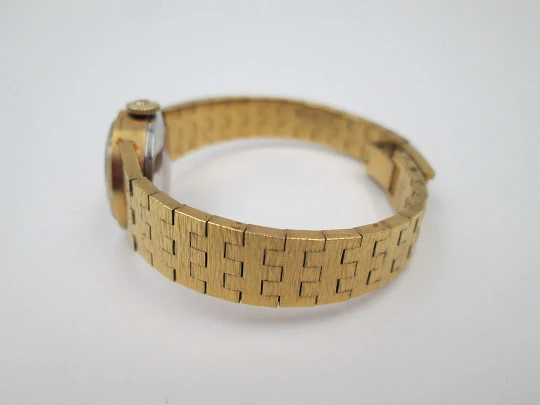 Omega mujer. Chapado oro y acero. Cuerda manual. Brazalete. Estuche. 1970